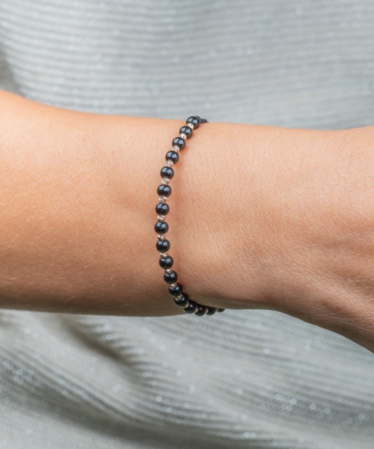 Mustast lõngast käevõru kulla ja oonüksitega - Kullaga keermestatud käevõrud - Goldinga