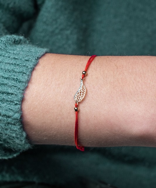 Punasest lõngast käevõru kuldripatsiga „Inglitiib“ - Kullaga keermestatud käevõrud - Goldinga