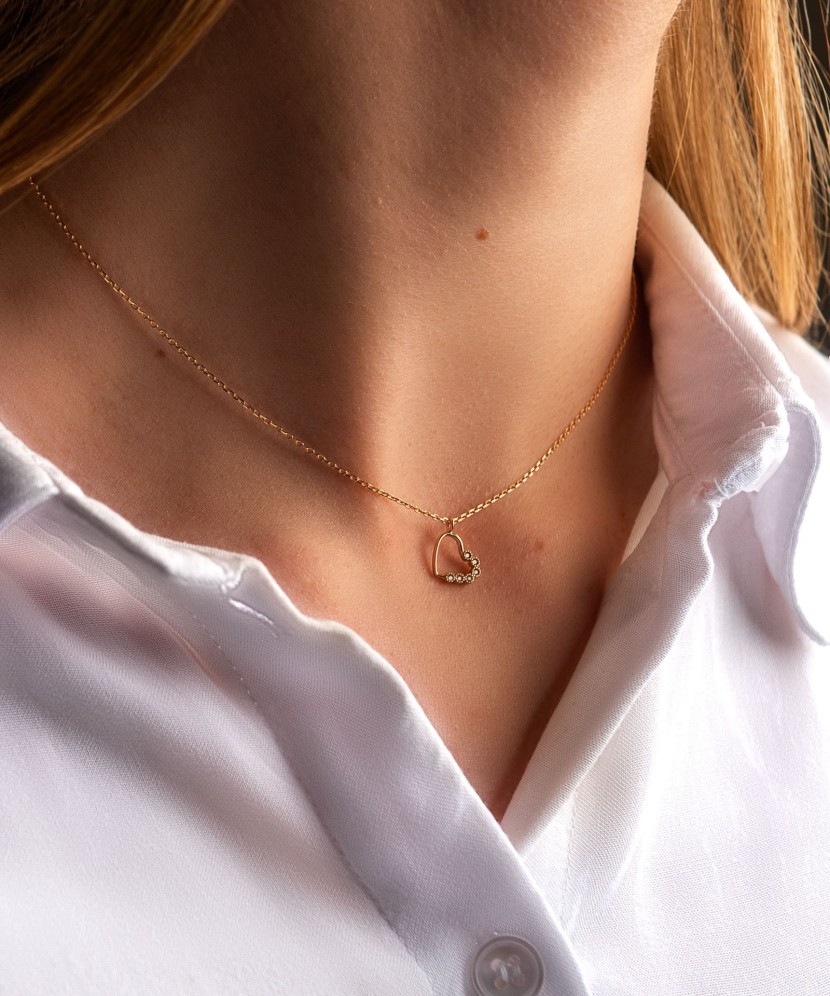 Kuldkett tsirkoonist ripatsiga "Süda"