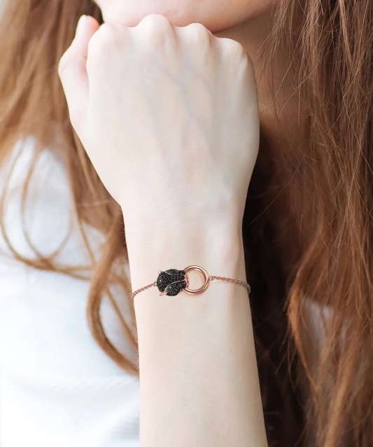 Kullatud hõbedast spinellidega käevõru