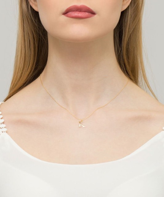 Kuldripats teemandiga täht K