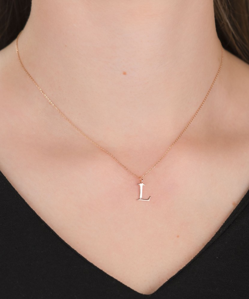 Kuldripats teemandiga täht L