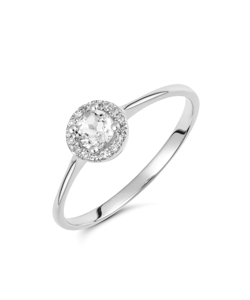 Valgest kullast sõrmus teemantide ja läbipaistva topaasiga