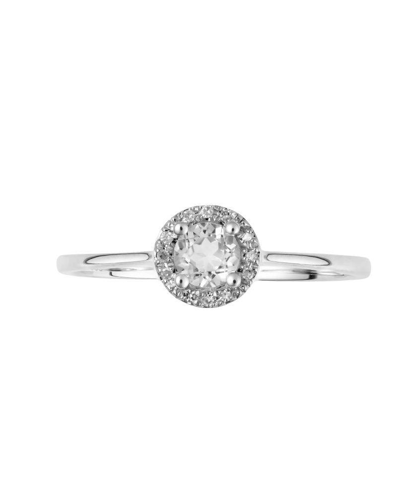 Valgest kullast sõrmus teemantide ja läbipaistva topaasiga