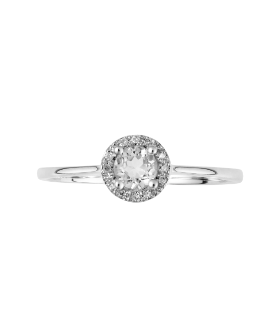 Valgest kullast sõrmus teemantide ja läbipaistva topaasiga