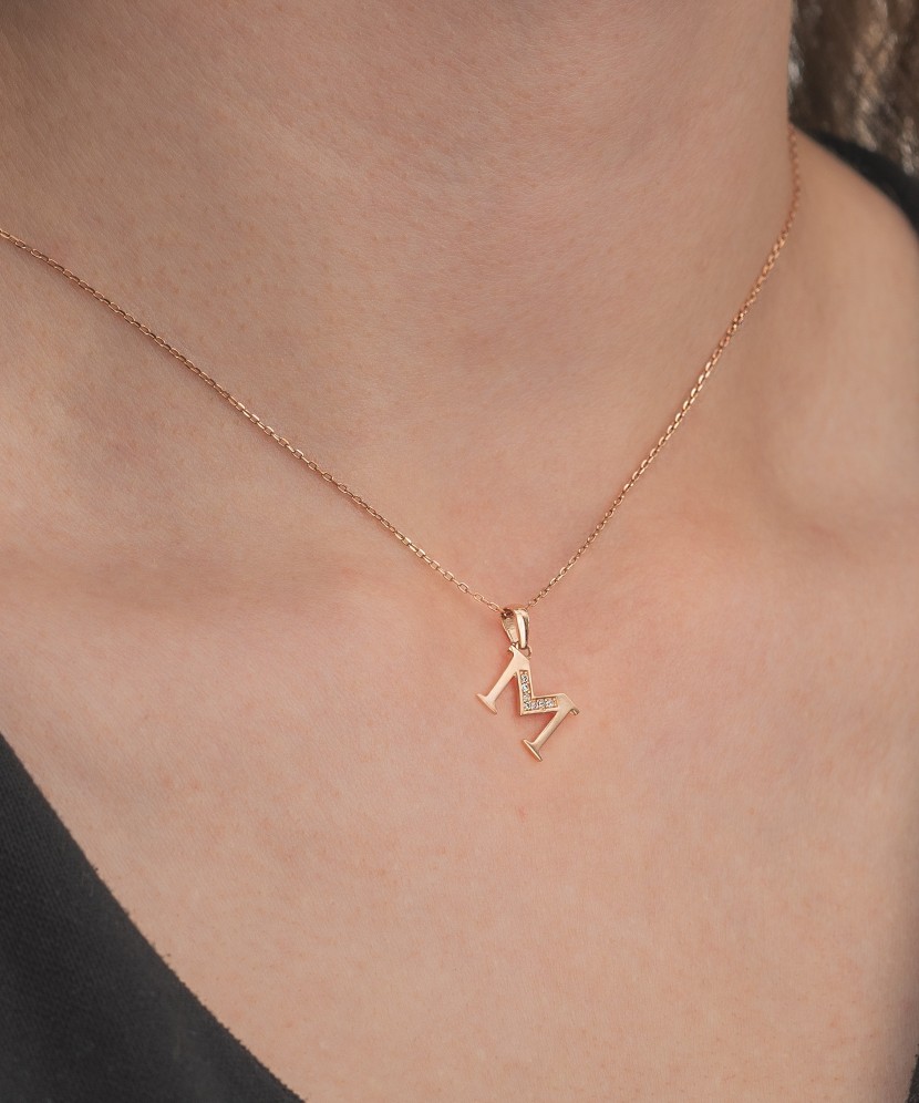 Kuldripats tsirkoonidega täht M