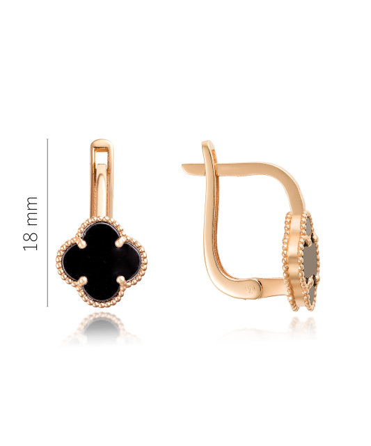 Золотая брошь с ониксами