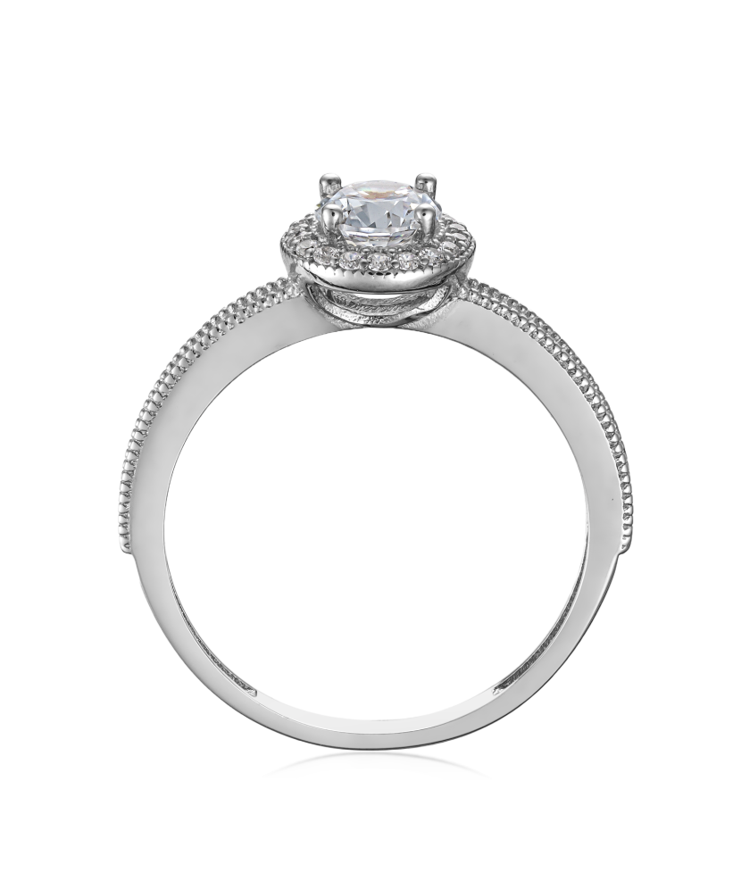 Valgest kullast sõrmus tsirkoonidega