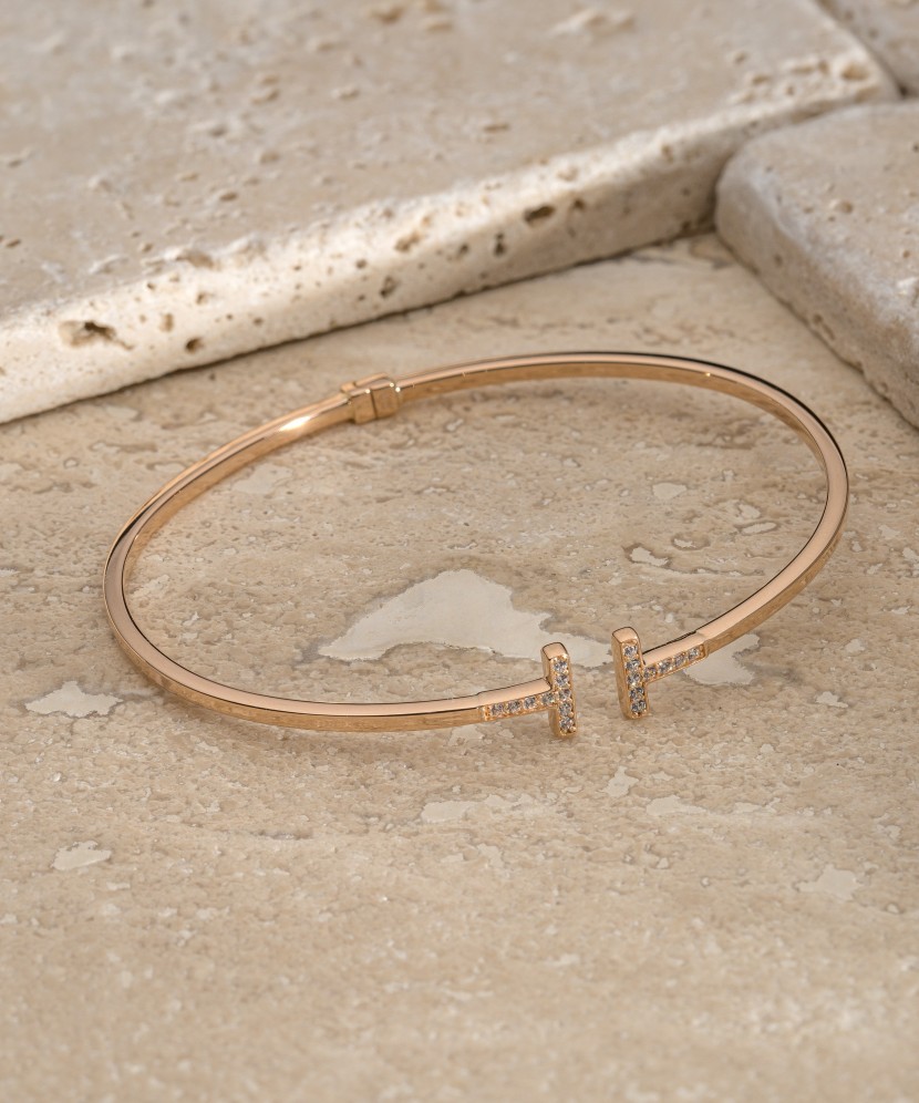 Jäik kullast käevõru tsirkoonidega