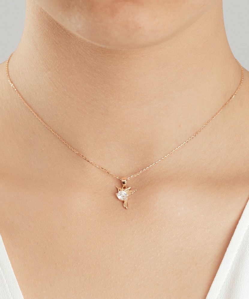 Kuldripats tsirkooniga "koolibri"