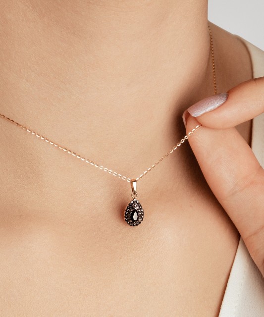 Kuldripats tsirkoonidega