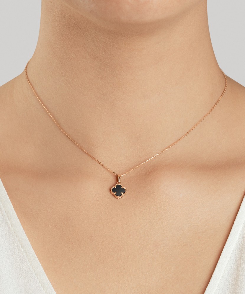 Kuldne ripats oonüksiga