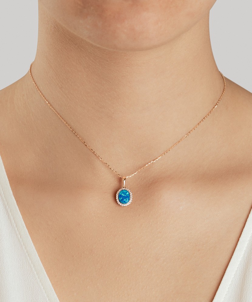 Золотая подвеска с опалом и цирконами