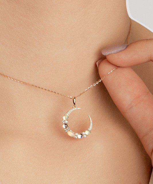 Kollase kulla ripats teemantide, opaalide ja topaasidega