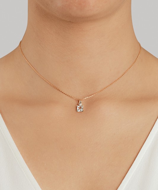 Kollase kulla ripats teemantide ja topaasiga