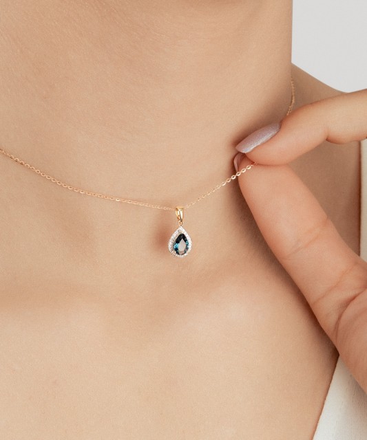 Kollasest kullast ripats teemantide ja London topaasidega