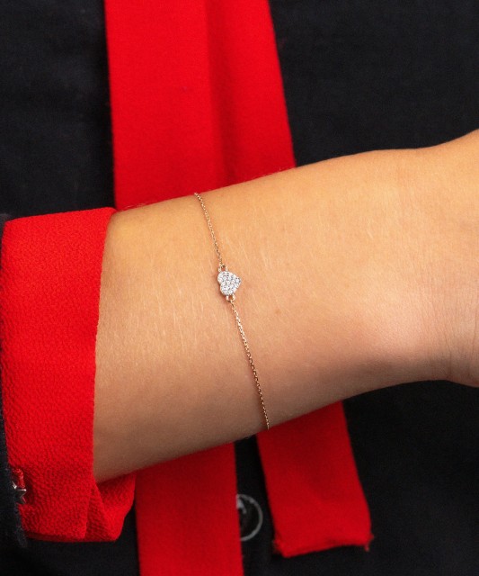 Kuldne käevõru teemantidega "süda"