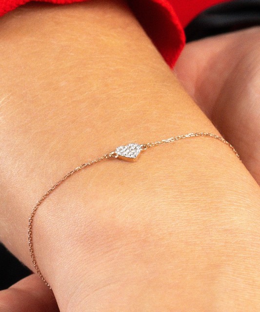 Kuldne käevõru teemantidega "süda"