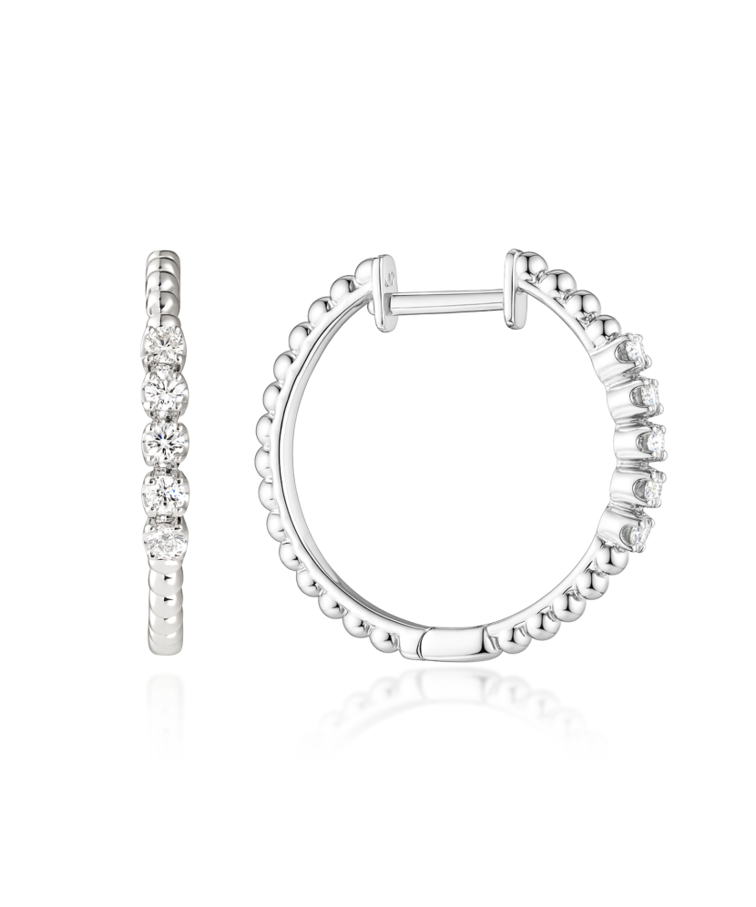 Valgest kullast kõrvarõngad teemantidega