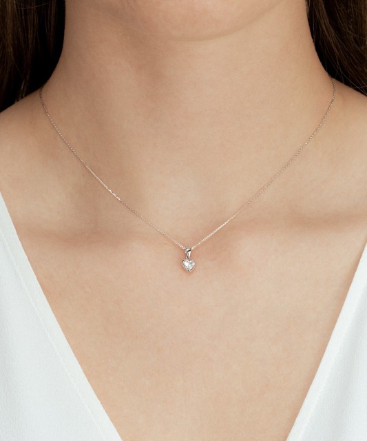 Valgest kullast ripats tsirkooniga "südameke"