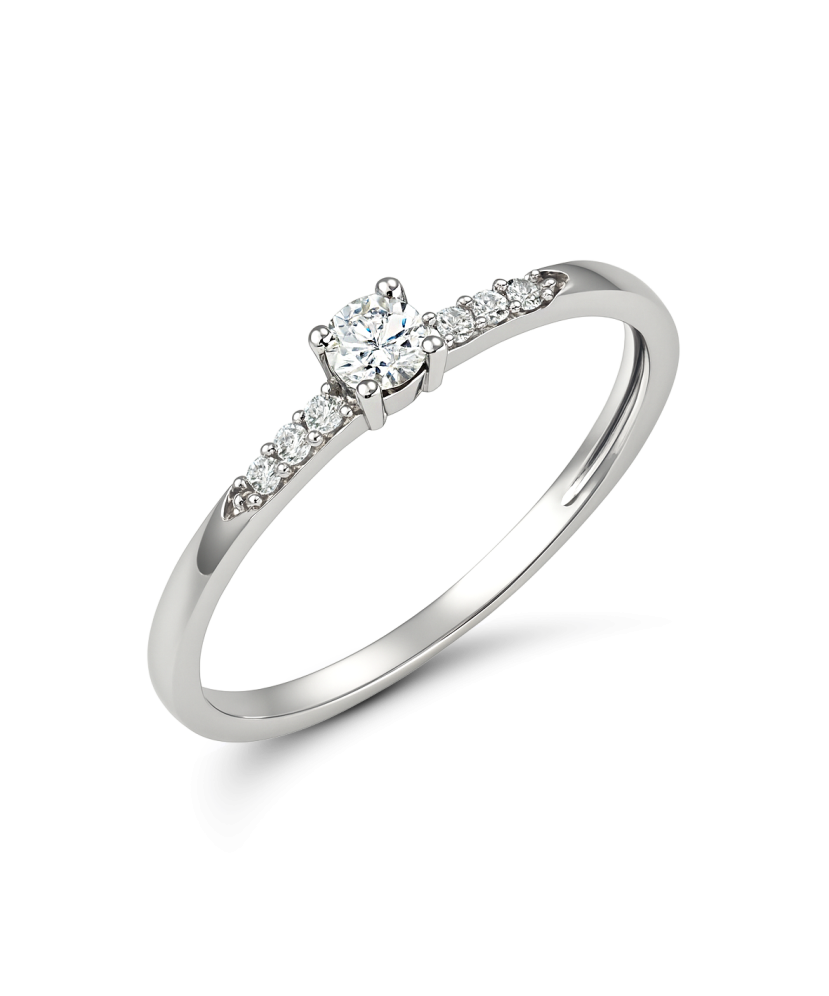 Valgest kullast sõrmus tsirkoonidega