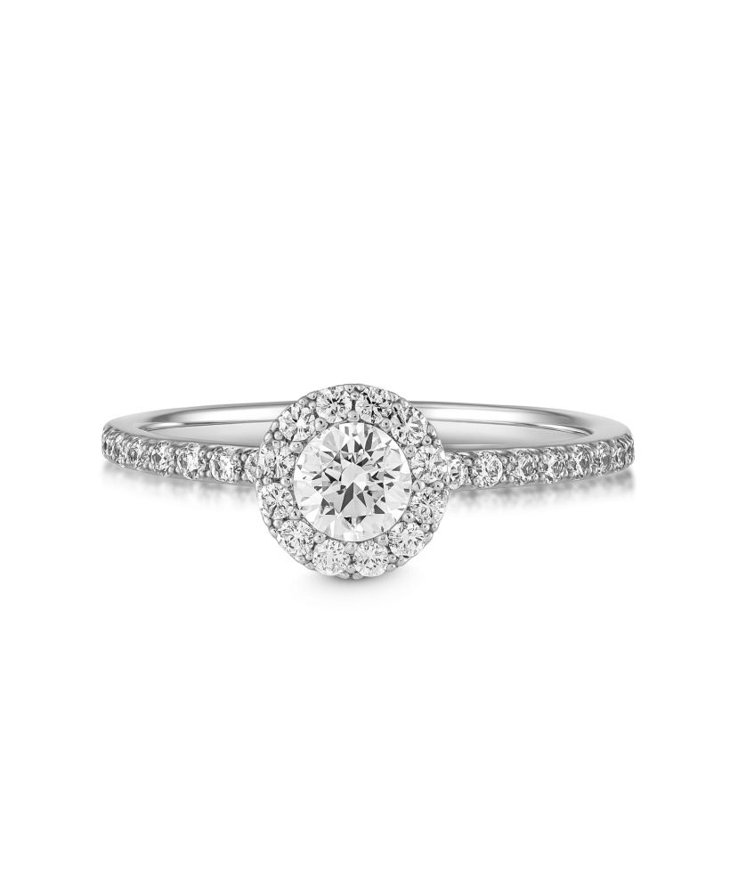 Valgest kullast sõrmus tsirkoonidega