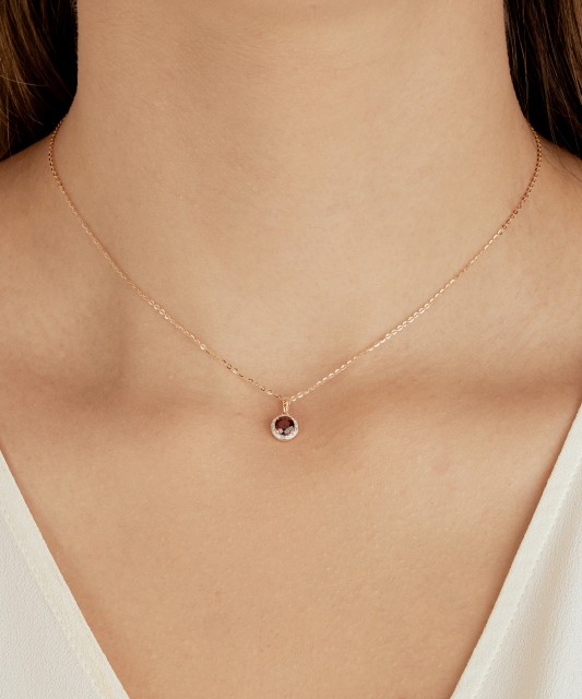 Kuldne ripats granaadi ja teemantidega