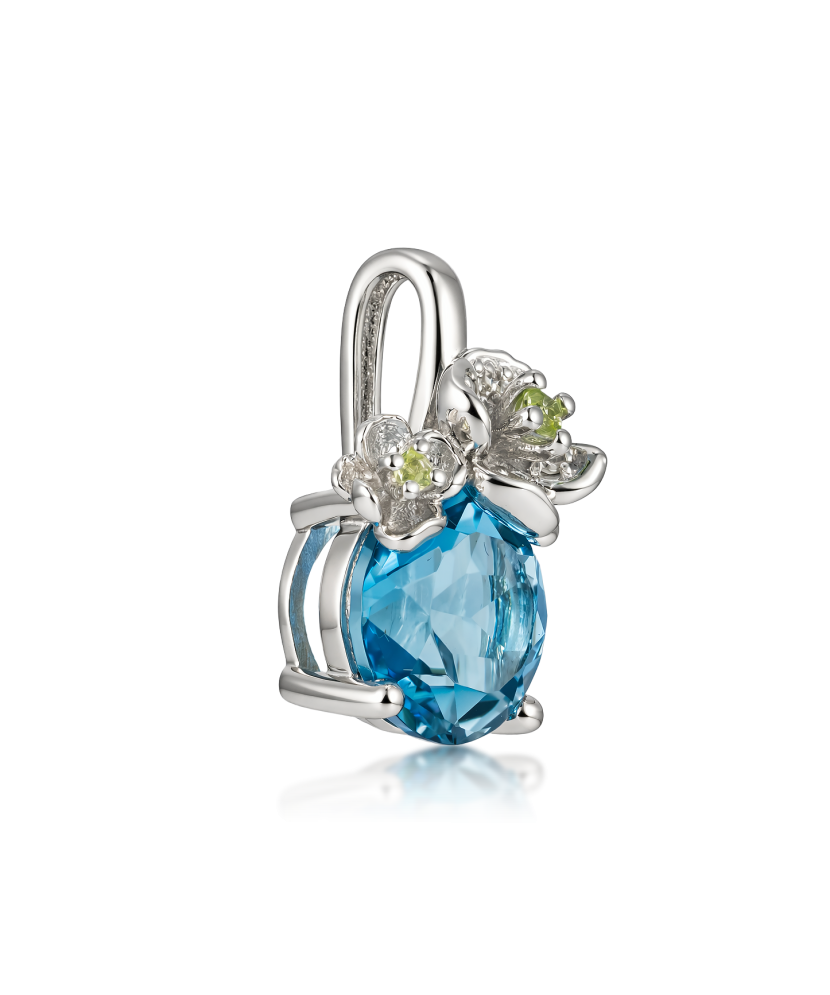 Valgest kullast ripats topaasi, teemantide ja peridootidega