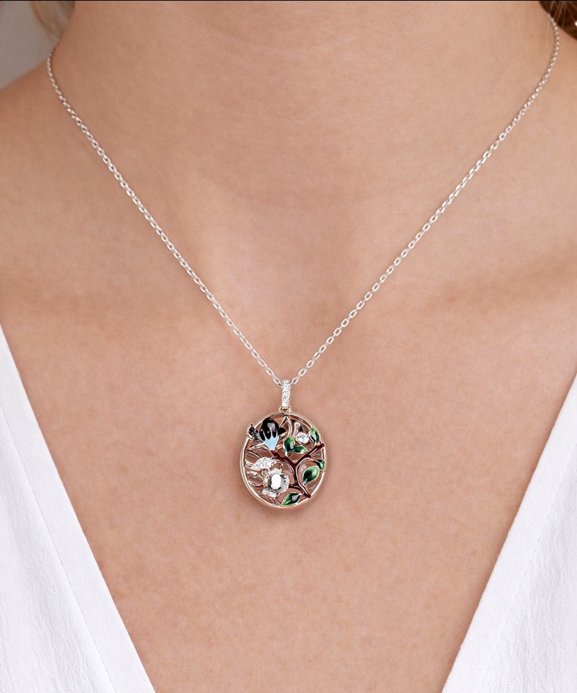 Hõberipats tsirkoonide ja emailiga