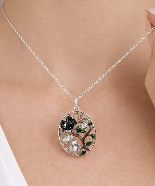 Hõberipats tsirkoonide ja emailiga