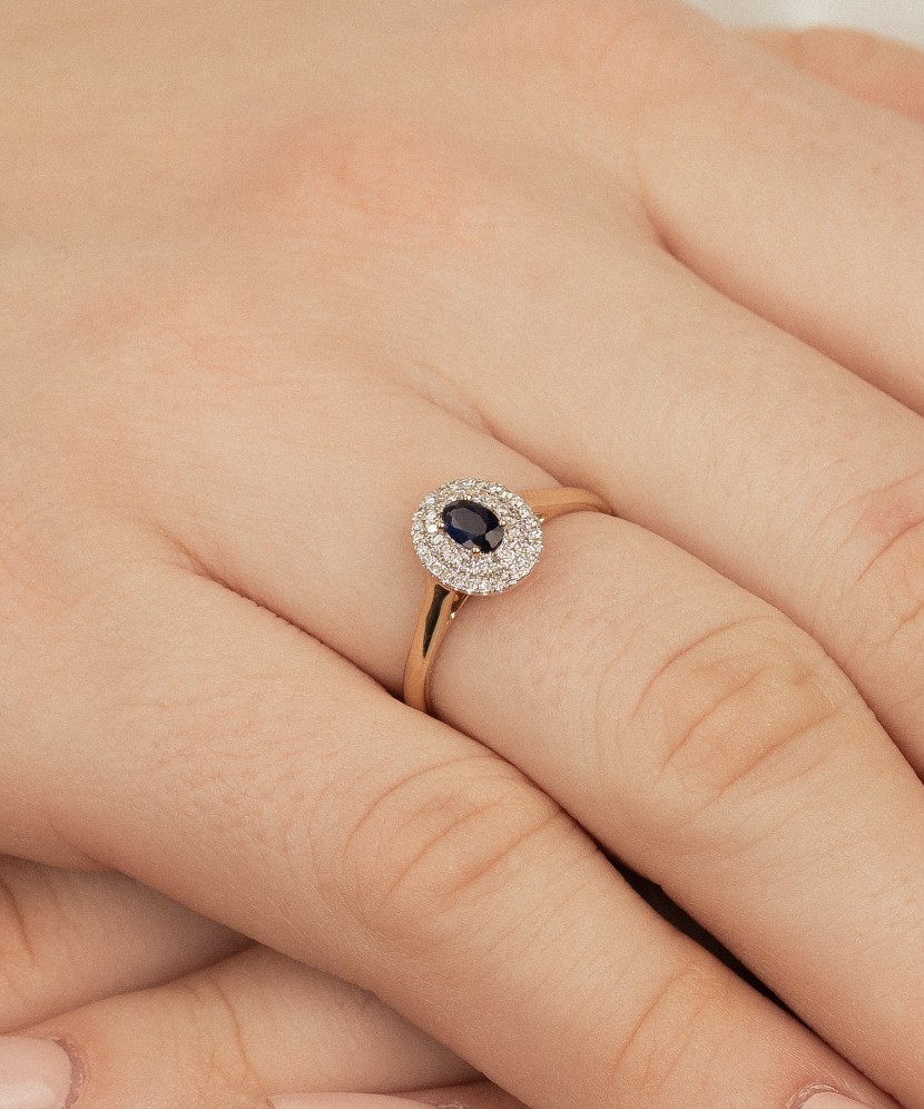 Kollasest kullast sõrmus safiiride ja teemantidega