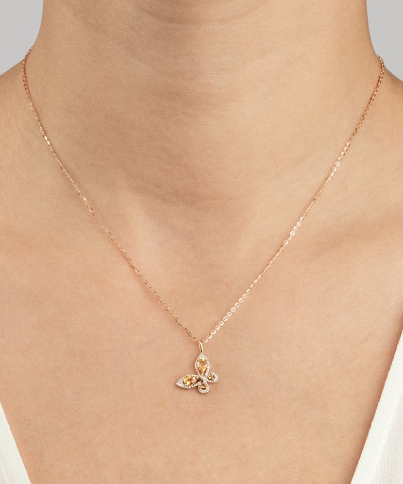 Kuldne ripats tsitriinide ja teemantidega