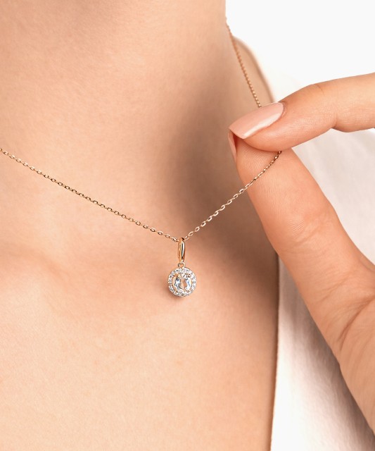 Kuldne ripats valge topaasi ja teemantidega