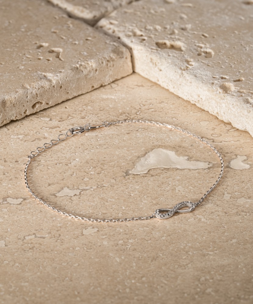 Браслет из белого золота с цирконами "Бесконечность"