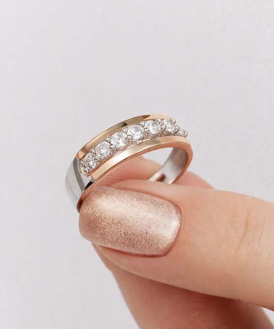 Hõbesõrmus kullatud tsirkoonidega