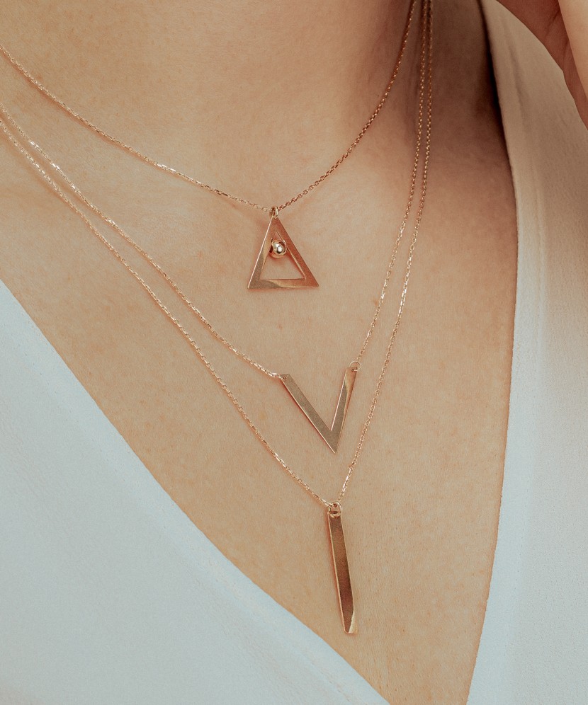 Kolmekordne kuldkett ripatsitega