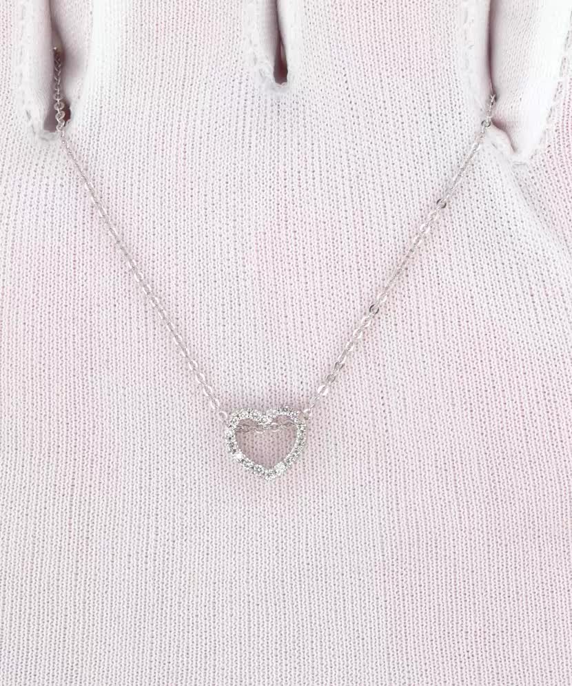 Valgest kullast kett briljantripatsiga "Süda"