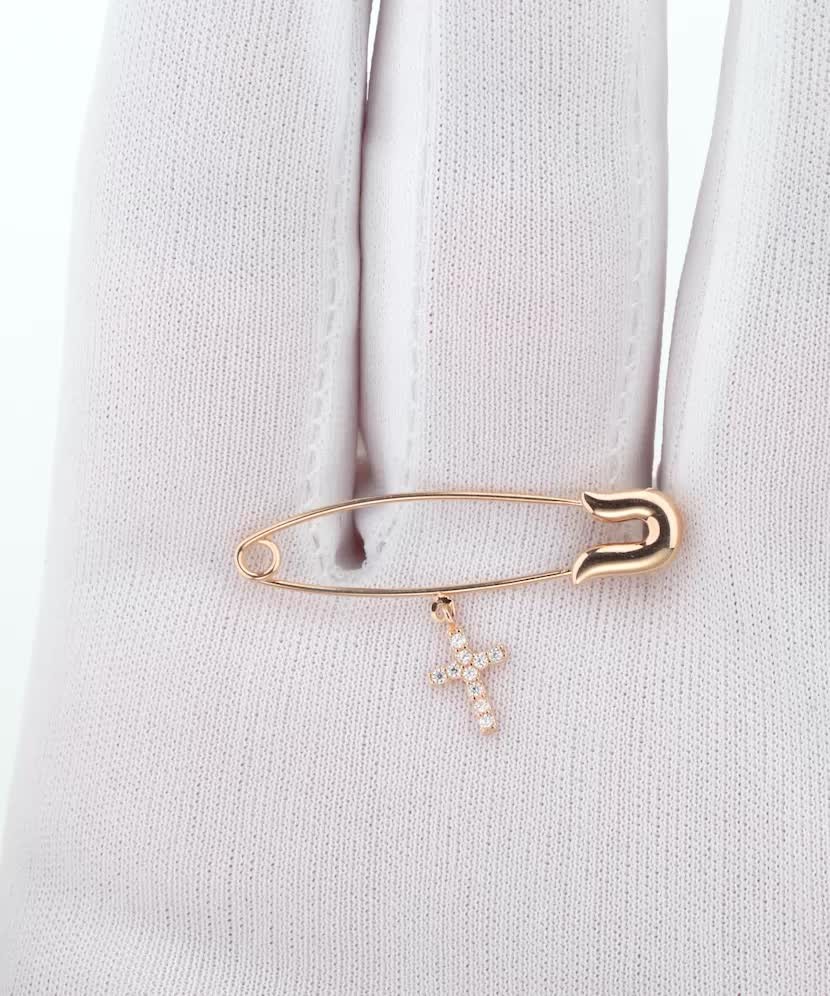 Золотая брошь с цирконами