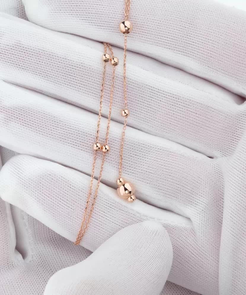 Двойная золотая цепочка с подвесками