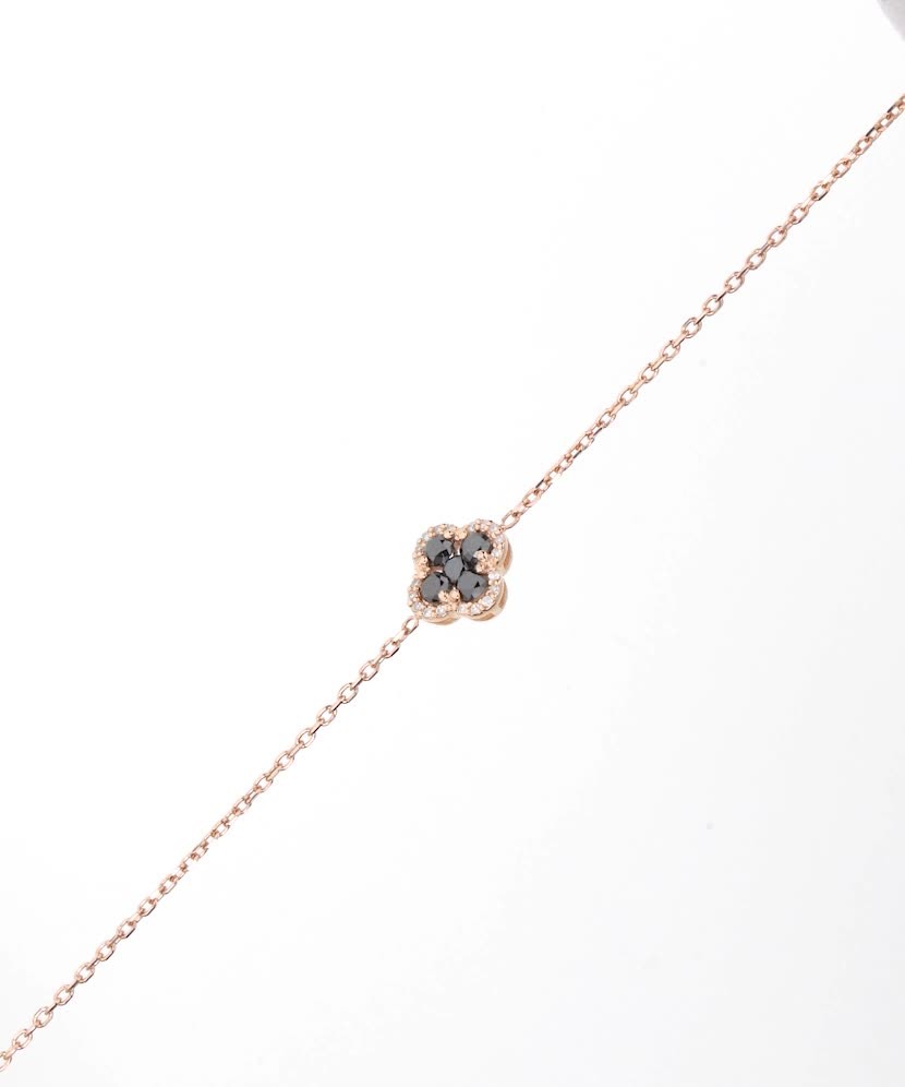 Mustade teemantidega kullast käevõru