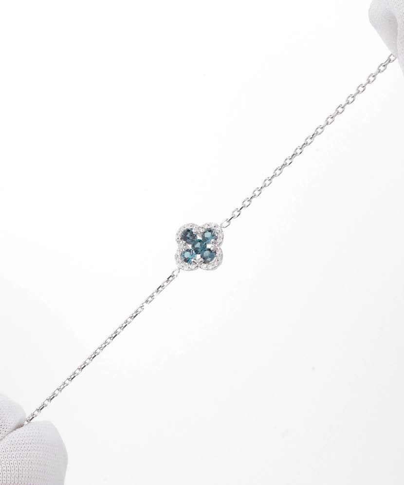 Браслет из белого золота с бриллиантами и лондонским топазом