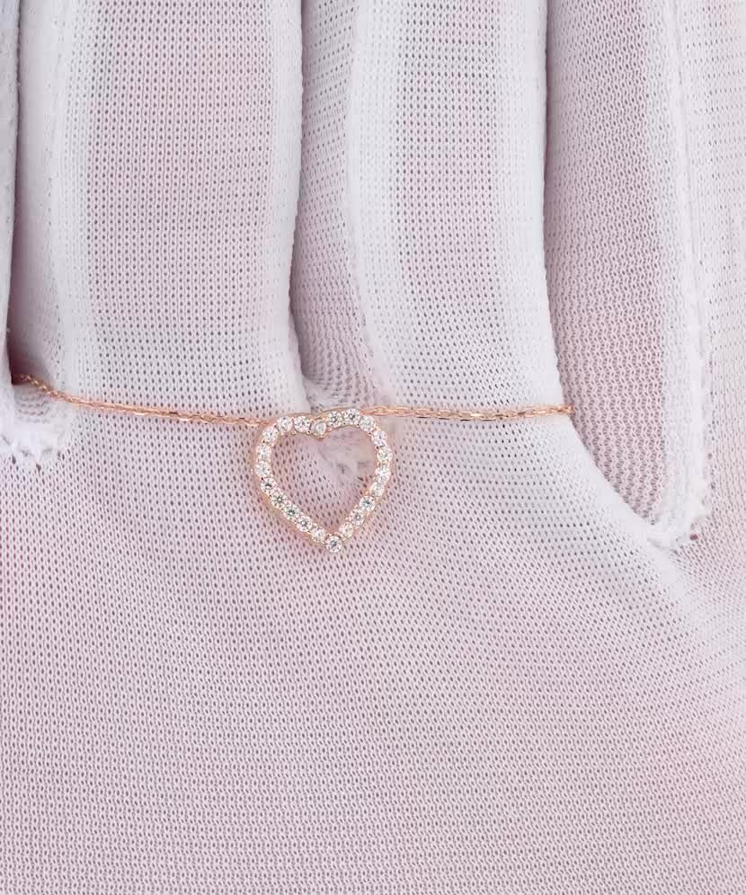 Kuldkett tsirkoonist ripatsiga "Süda"