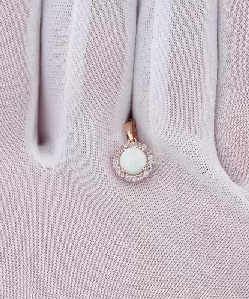 Kuldne ripats opaali ja tsirkoonidega