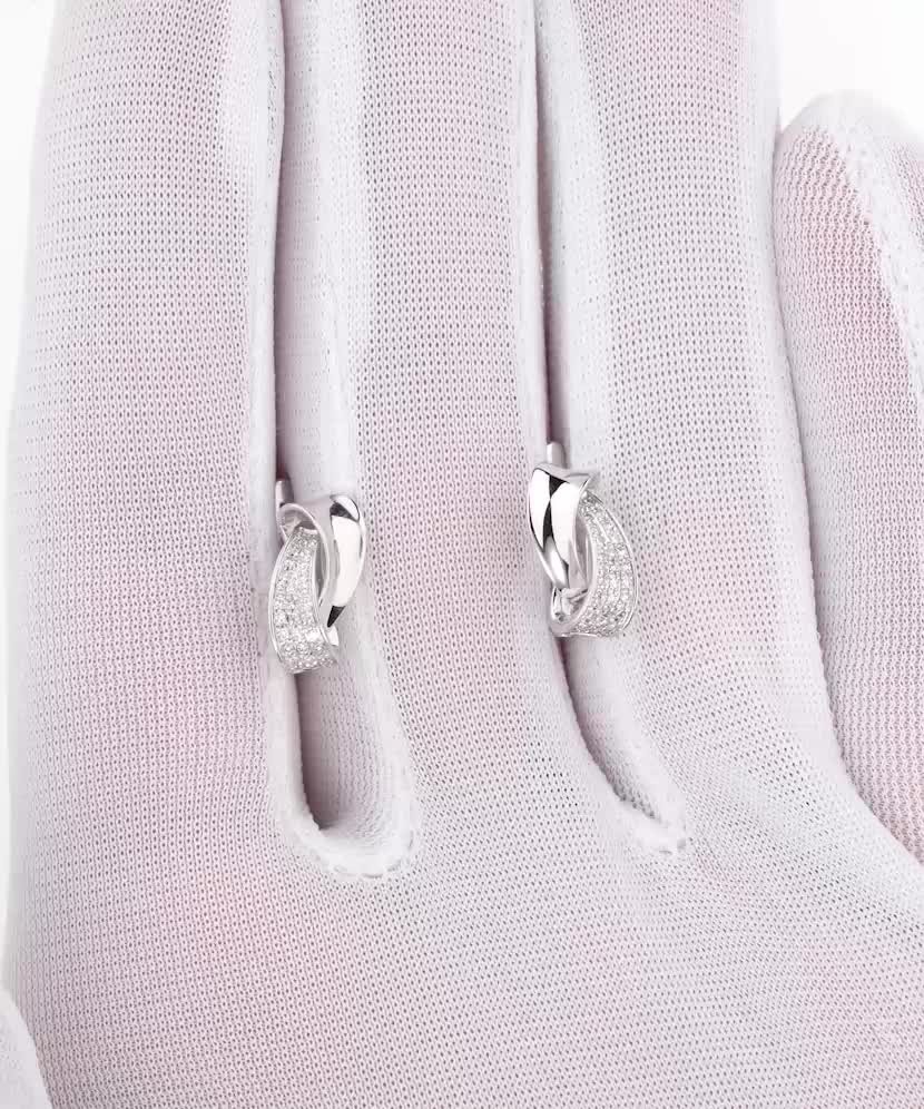 Valgest kullast kõrvarõngad teemantidega