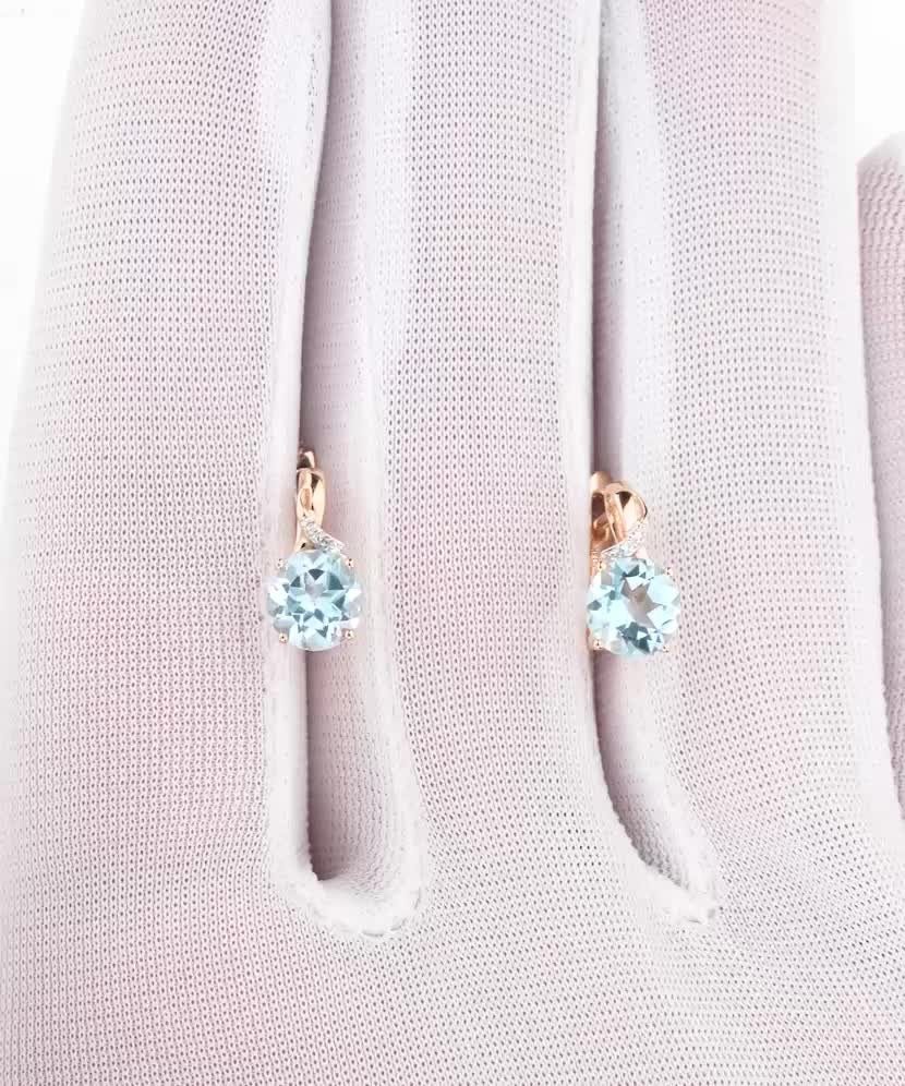 Kuldkõrvarõngad teemanditega ja topaasidega