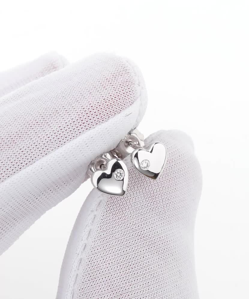 Valgest kullast kõrvarõngad teemantidega