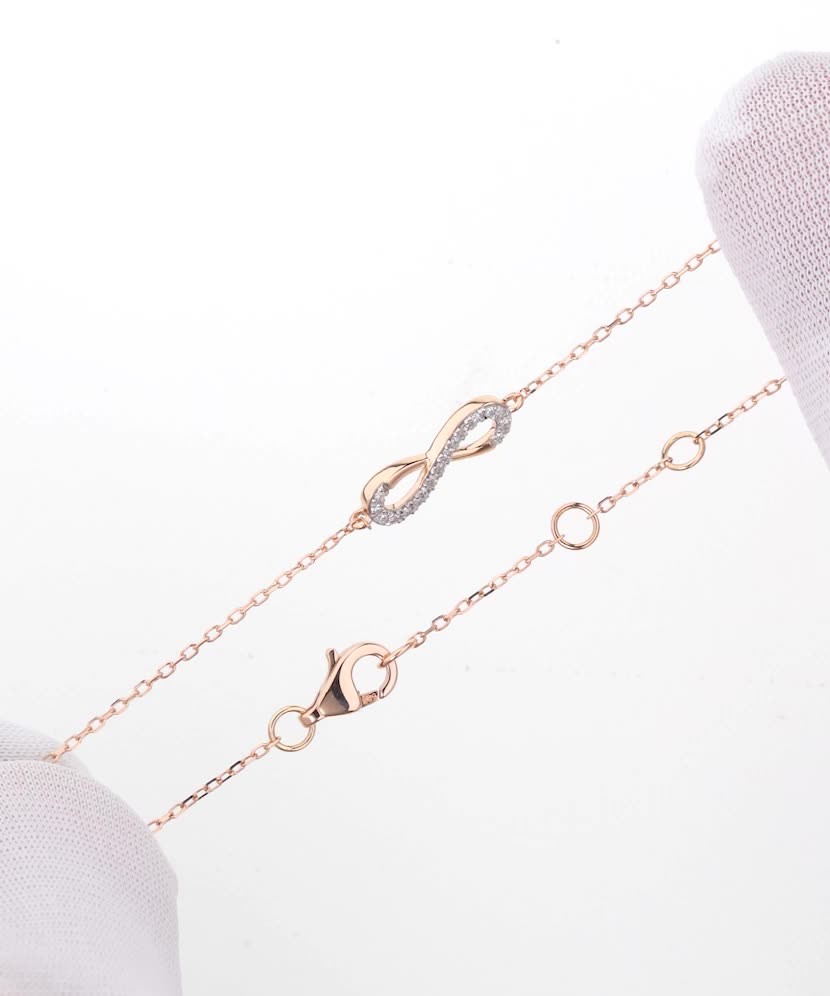 Золотой браслет с бриллиантами "Бесконечность"