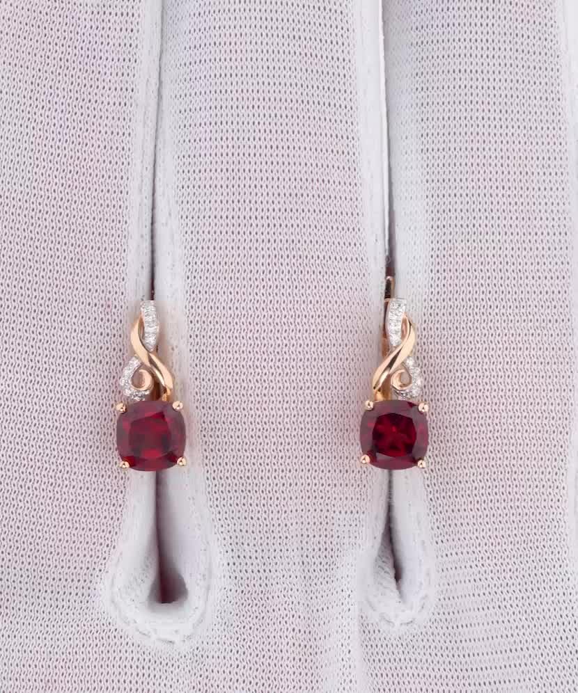 Золотые серьги с гранатом и бриллиантами