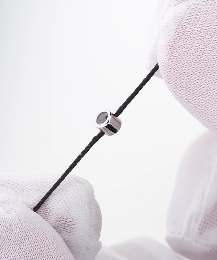 Musta niidiga käevõru musta teemandi ja valge kullaga