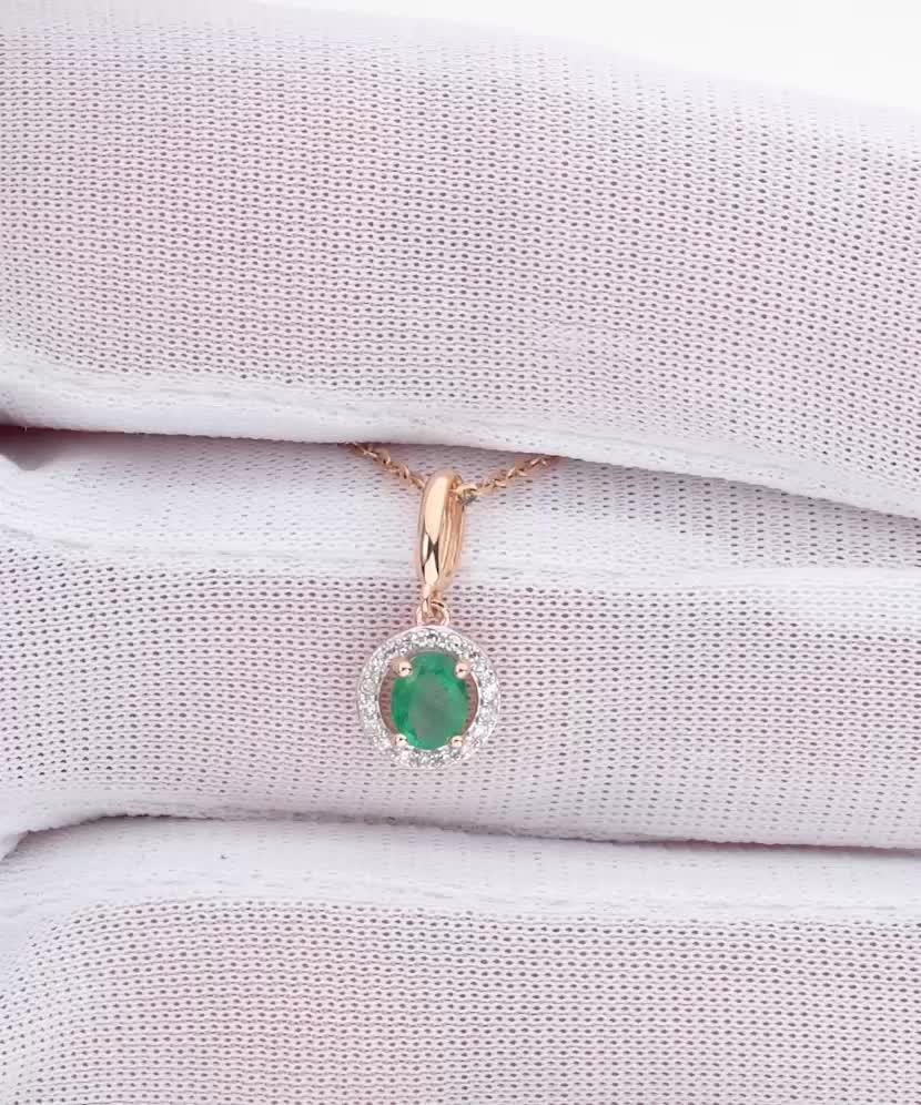 Kuldne ripats smaragdi ja teemantidega